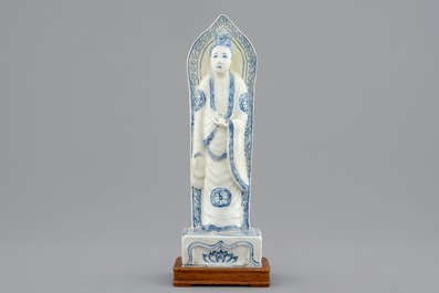 A Chinese blue and white figure of Guanyin on a base, the back inscribed, probably Wanli, Ming Dynasty
